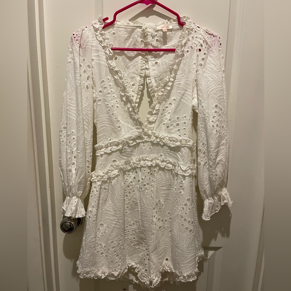 White size small. Backless romper